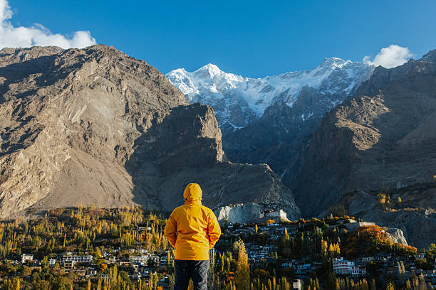 istock Chinese Man Looking at Dramatic Mountain Landscape 2251141376