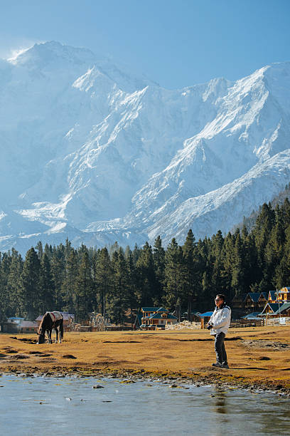 istock Asian Man Standing Fairly Meadows Beneath Nanga Parbat 2251141417