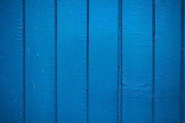 old wooden wall, blue background
