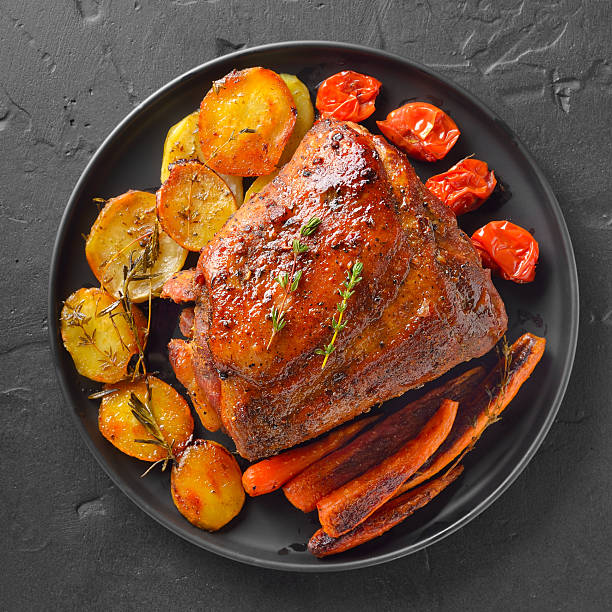 istock Grilled pork, fried potatoes and carrots 2251144719