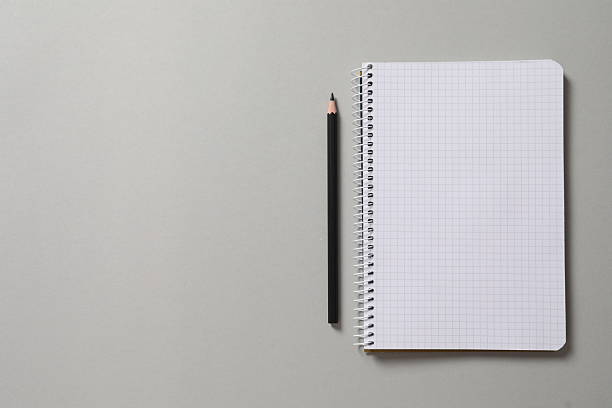 istock Flat lay with pencil and notebook on grey background, top view 2251145658