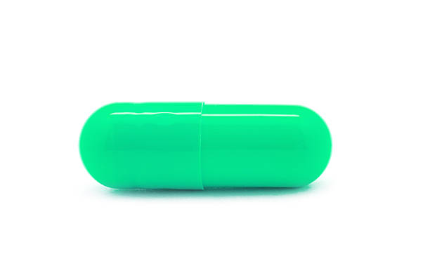 istock pills capsules isolated on white background 2251147220