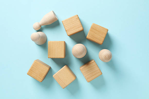 istock Blank wooden cubes for different concepts, top view 2251151760