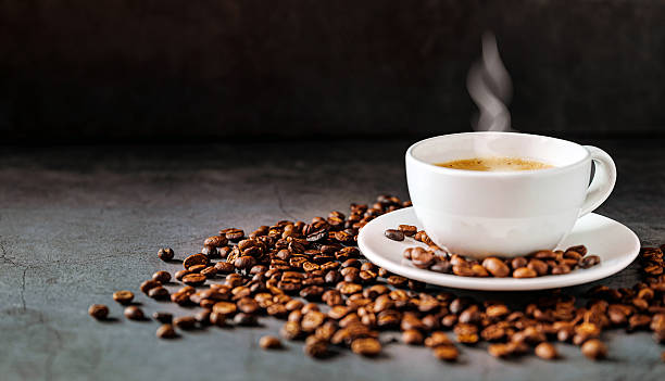 istock Coffee cup and coffee beans on gray background, Espresso coffee cup aromatic 2251152962
