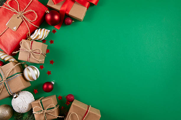 istock Green Christmas background with ornaments 2251155595