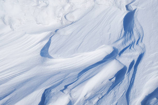 istock Texture of winter snow surface. Blue natural snow background. 2251155850