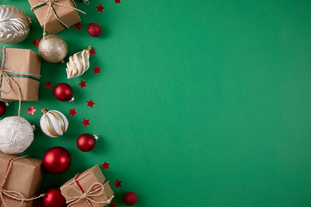 istock Green Christmas background with ornaments 2251157103