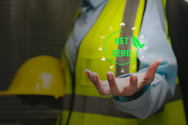 istock Sustainability concept. Hand holding digital net zero icon, environmental responsibility insight, carbon reduction planning, green policy development, eco efficiency management. 2251162624