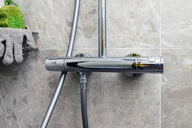 istock Smart chrome thermostatic bath shower mixer. Closeup. 2251165952