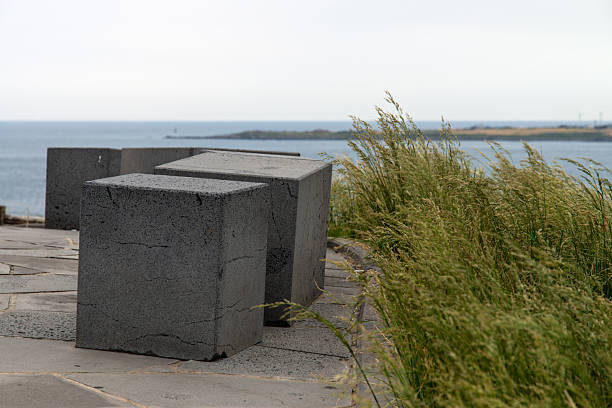 istock concrete cube seats on the seaside cliff 2251166273