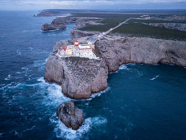 istock Cape Saint Vincent, Lighthouse and Atlantic Ocean in Evening Twilight. Aerial Drone Shot. Algarve, Portugal 2251171326