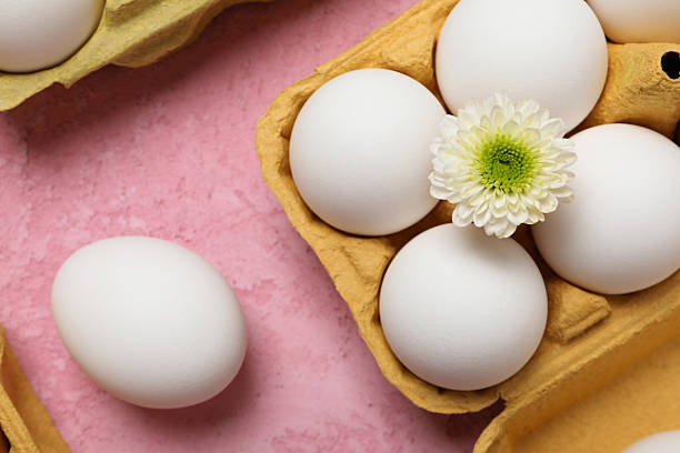 istock Concept of spring, eggs with flowers, top view 2251173006