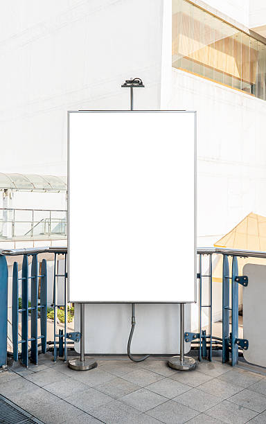 istock Mock up white screen on outdoor pole vertical billboard. Clipping path for mockup 2251173736