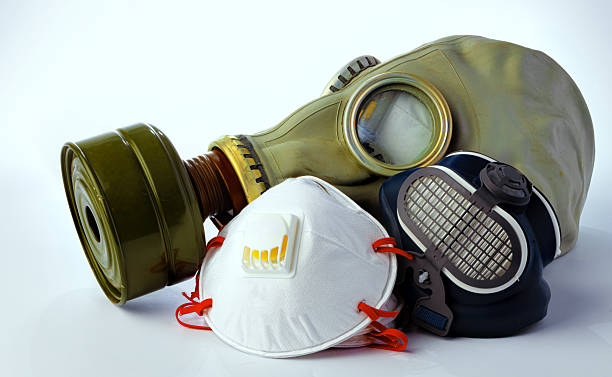istock Gas mask with medical mask on white background 2251175555