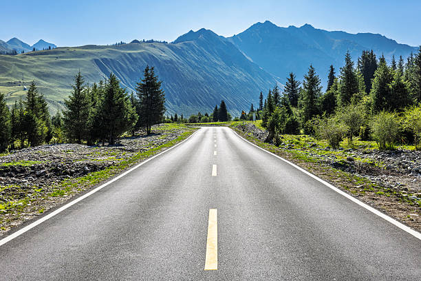 istock Asphalt road and mountain background 2251178712