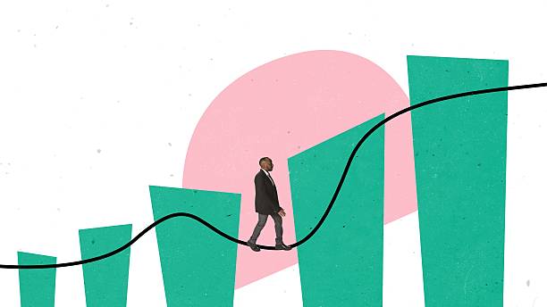 istock Minimal artwork showing a businessman balancing on a rising and falling chart line across bold geometric shapes. 2251180633