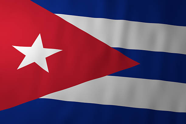 The image shows the national flag of Cuba, featuring five alternating blue and white horizontal stripes. On the left side is a red triangle with a single white star, symbolizing independence, freedom, and the unity of the Cuban people.