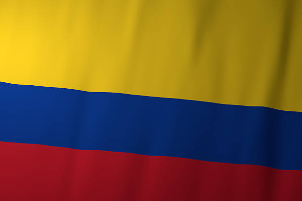 The image shows the national flag of Colombia, featuring a wide yellow stripe on the top symbolizing the nation’s wealth and resources. Beneath it are blue and red horizontal stripes, representing the seas and the blood shed for independence.