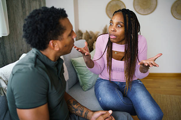 istock Black couple having emotional argument about relationship problems. 2251184617