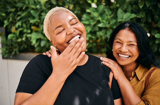 istock Joyful Diverse Women Laughing Together During A Relaxing Walk In Nature 2251185708