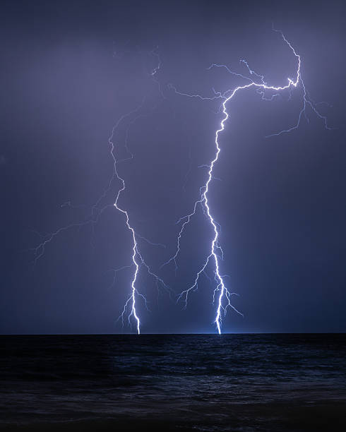 istock Tropical Lightning Storm Over the Ocean 2251186815
