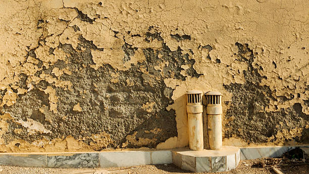 istock building erosion with ventilation pipes and debris base 2251186954
