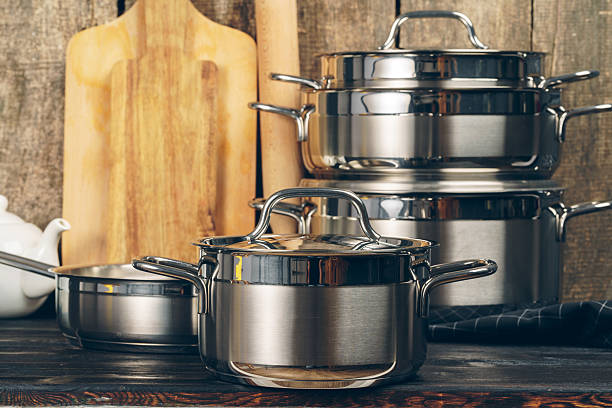 istock Set of dishware against old wooden background 2251190596