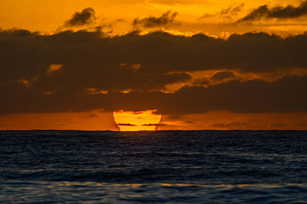 Golden sun rising over the horizon in Australia