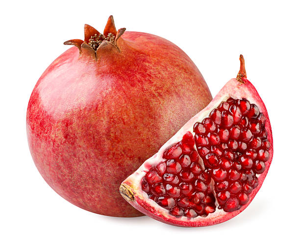 istock Ripe pomegranate fruit and slice close-up on a white. Isolated 2251193714
