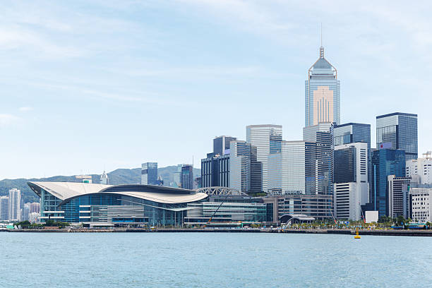 Hong Kong skyscraper panorama on a sunny day, bright urban seascape