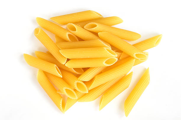 Italian penne pasta isolated on white background.
