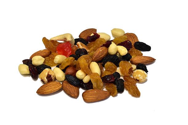 istock A mixture of several types of nuts and raisins. 2251198930