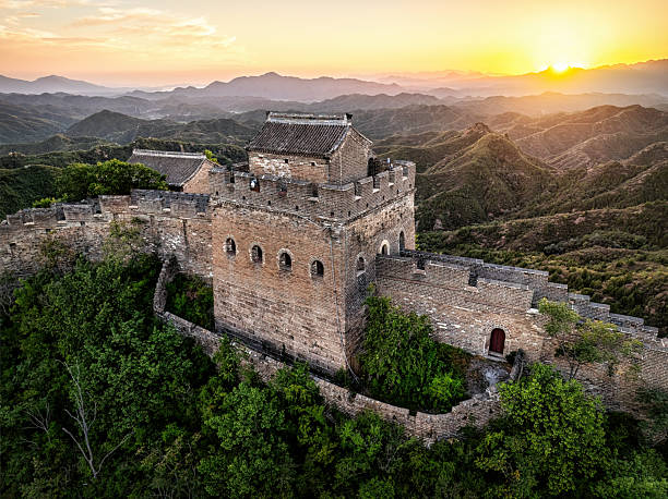 istock Great Wall of China ancient stone architecture winding through rolling mountains at sunset, a historical landmark and popular travel destination in Asia 2251199841
