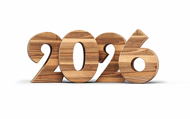istock New Year 2026 Written with Wooden Material Object + Shadow Path 2251200229