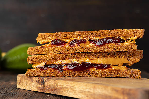 istock Double sandwich with peanut butter and berry jam 2251201763