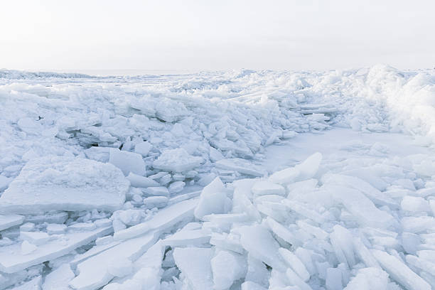 istock A bright icy shoreline features jagged white ice shards piled along the coast 2251201985