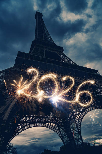istock Eiffel Tower In Paris By Night With Fireworks And Sparkler 2026 2251205744