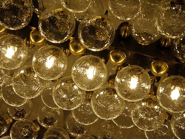 istock Lot of bulbs organized in rows on ceiling 2251211372