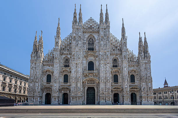 istock Milan Cathedral Front: Gothic Architecture, Intricate Stonework, And Spires On A Bright Day 2251219894
