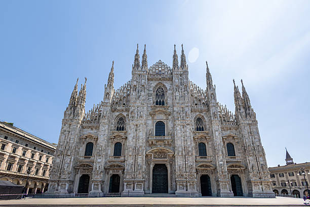 istock Milan Cathedral Front: Gothic Architecture, Intricate Stonework, And Spires On A Bright Day 2251219896