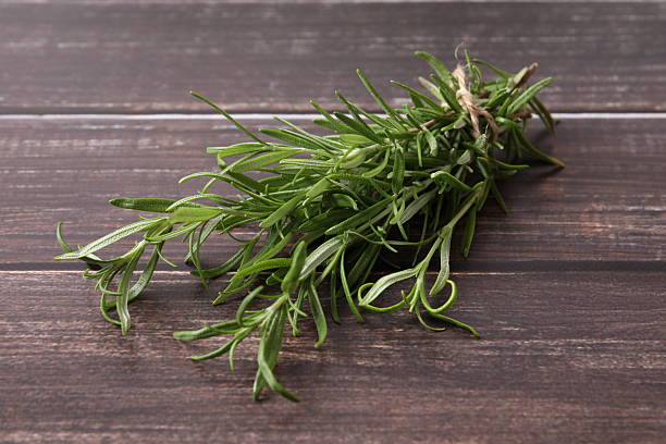 istock Green rosemary on the table 2251220966