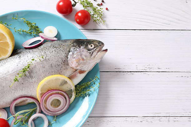Raw fish trout with spices