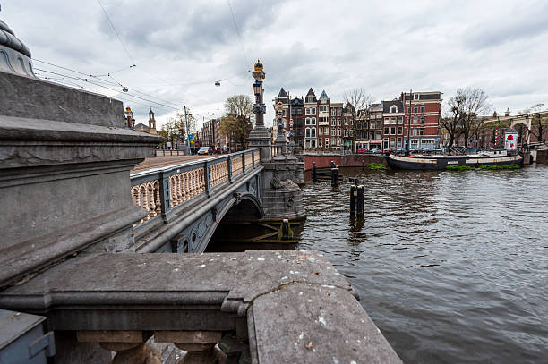 Amsterdam, Netherlands - April 7, 2012. Outoor scene showing the Amstel river in Amsterdam.