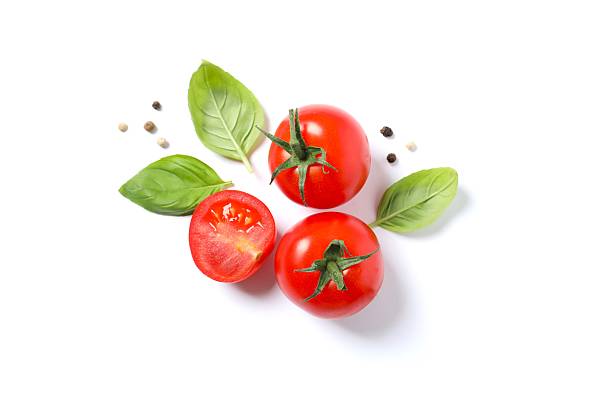 istock Fresh red tomatoes, pepper and basil on white background, top view 2251224885