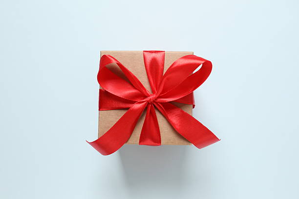 istock Beautiful gift box on color background 2251226562