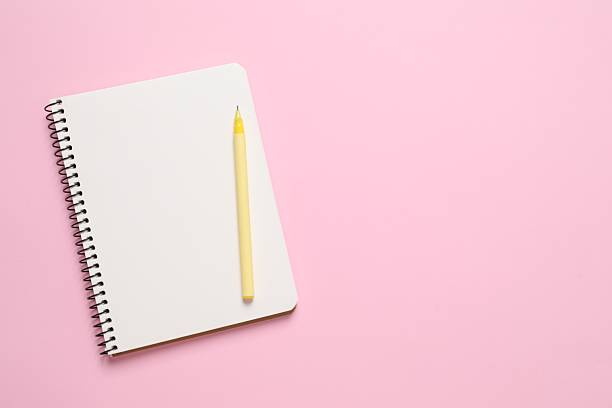 istock Flat lay with pen and notebook on color background, top view 2251228656