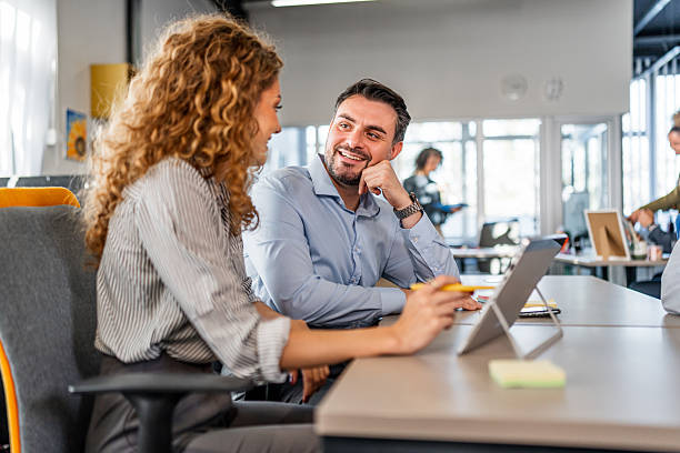 istock Business colleagues collaborating at office meeting using digital tablet 2251228895