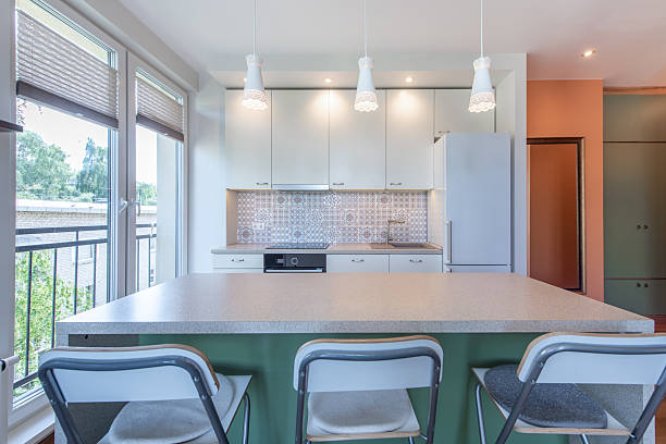 istock Modern Home Kitchen Interior with Scandinavian Design Featuring Island Counter and Natural Light 2251232322