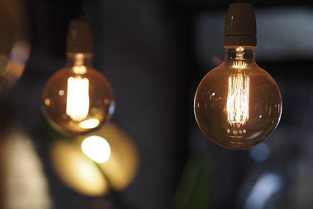 istock Warm glow of vintage light bulbs in a cozy setting 2251232372