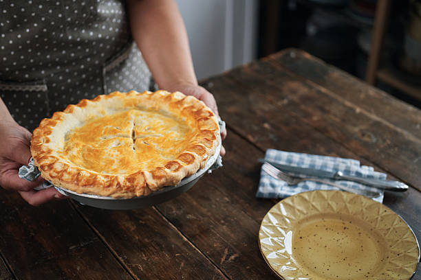 istock Preparing Thanksgiving Leftover Pie with Turkey, Vegetables and Boiled Eggs 2251233178